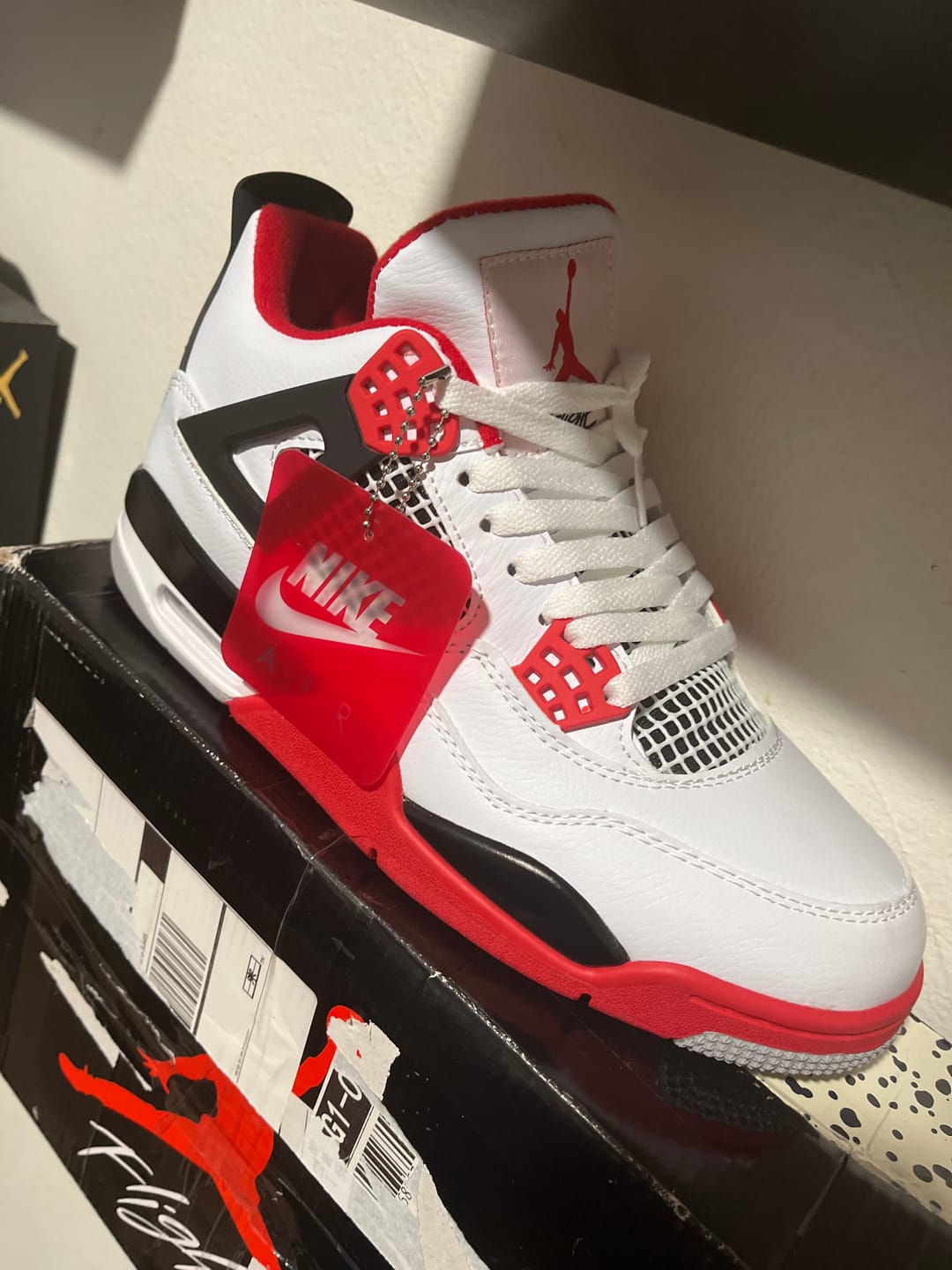 Customer photo review of JORDAN 4 x FIRE RED