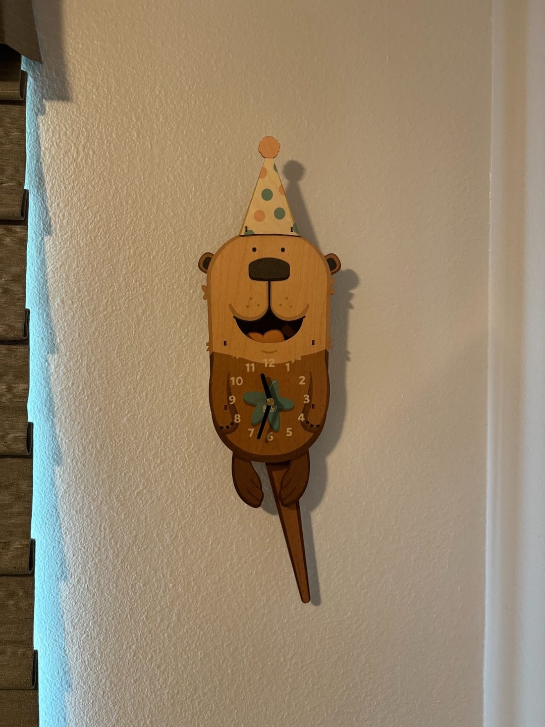 Customer photo review of Lola the Otter Pendulum Clock