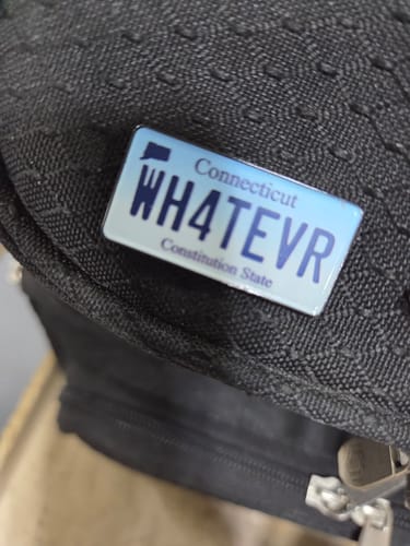Customer photo review of Connecticut License Plate Enamel Pin