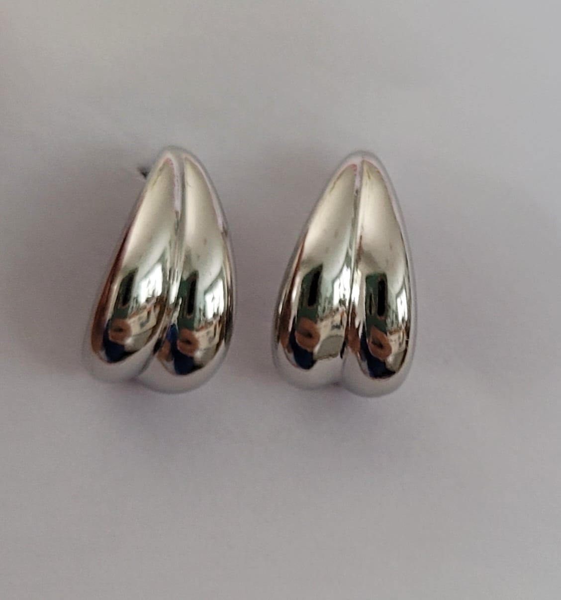 Customer photo review of Shae 18k White Gold Plated Semi-Hoop Curved Stud Earrings