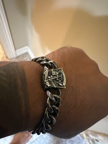 Customer photo review of St. Michael's 'Protect Us' Cuban Link Bracelet: Helps Pair Veterans With A Service Dog Or Shelter Dog