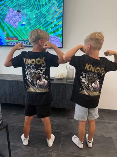 Customer photo review of ASTRO KNEE KIDS TEE BLACK