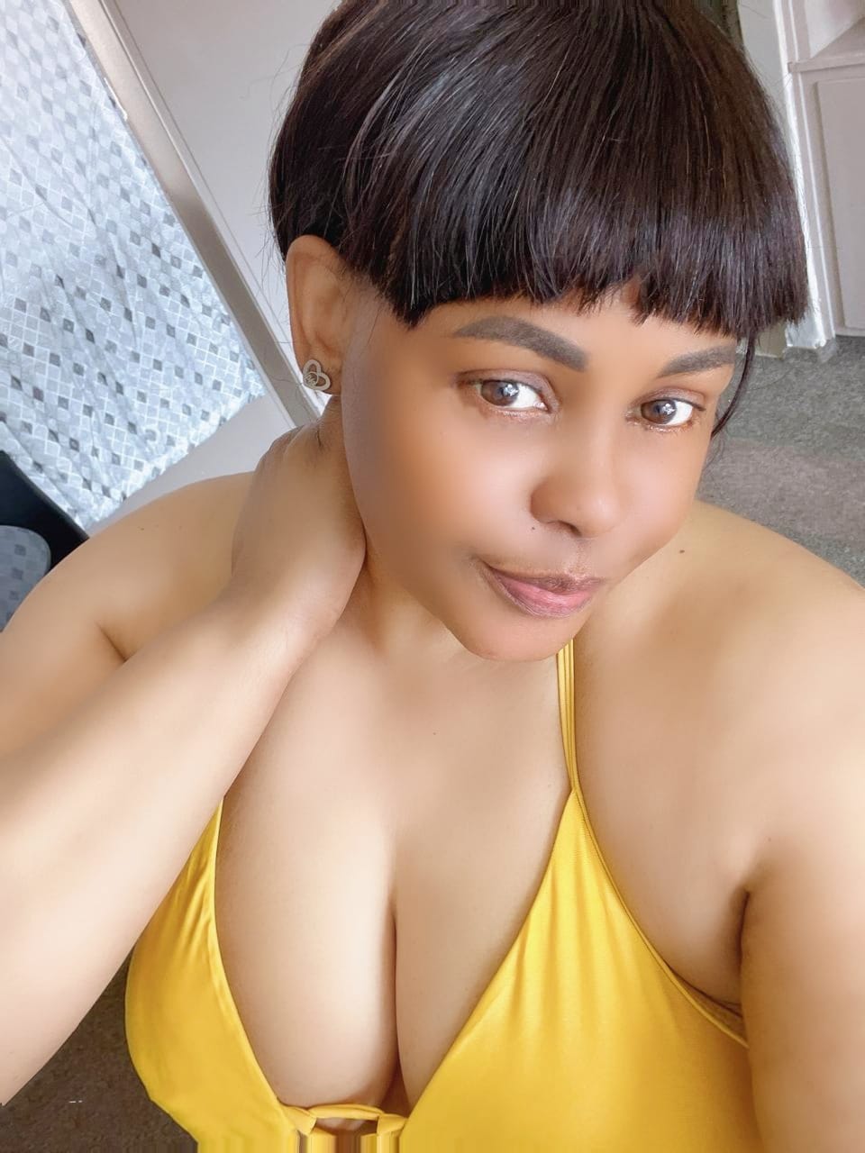 Customer photo review of Silver Thando Studs