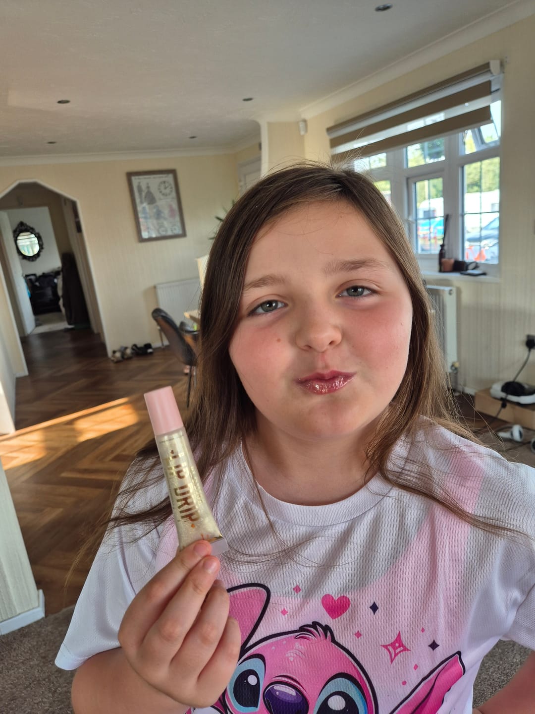 Customer photo review of P. Louise Lip Drip Keychain Lip Gloss