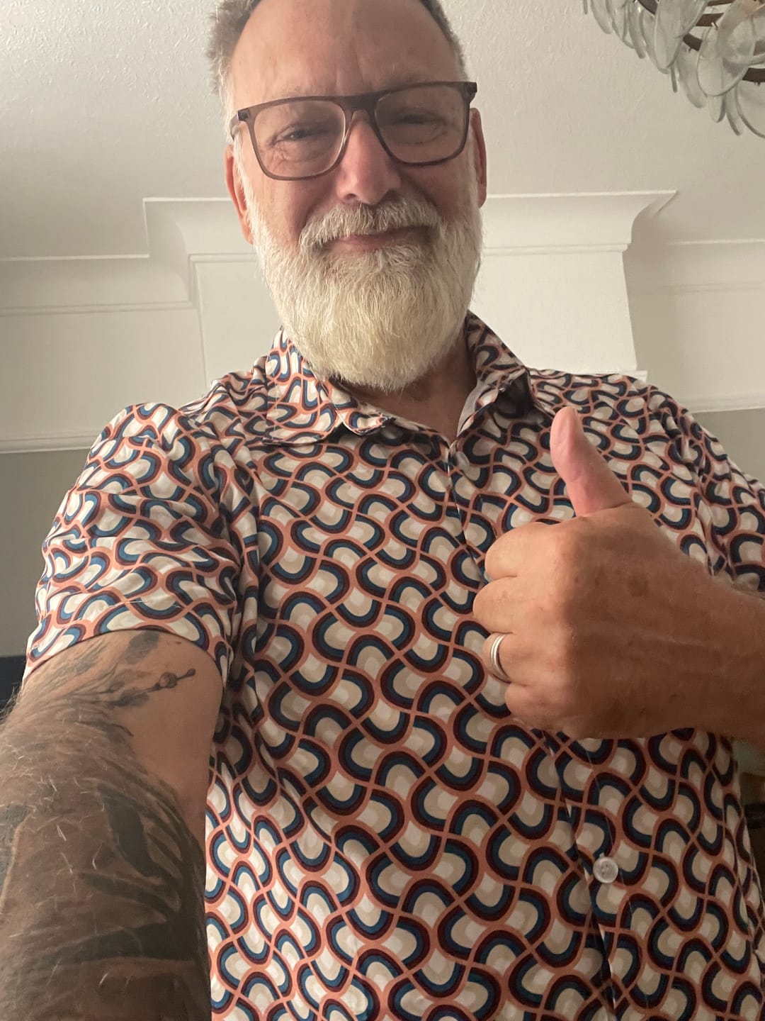 Customer photo review of Men's Retro Button Up Vintage Geometric Circle Cool Summer Beach Short Sleeve Shirt