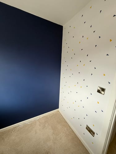 Customer photo review of TRIANGLE CLUSTER Wall Stencil
