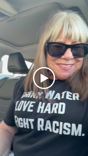 Customer video review of Drink Water Fight Racism Unisex T-shirt