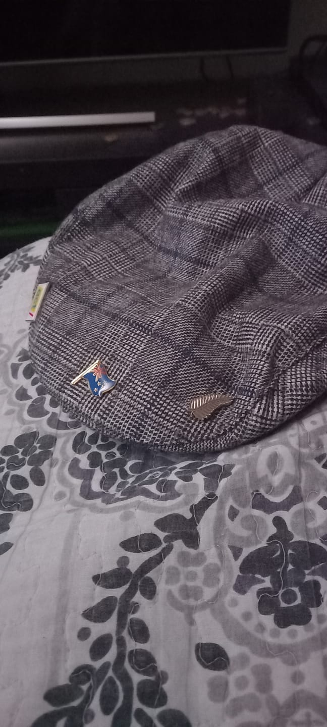 Customer photo review of Silver Fern Pinback Badge