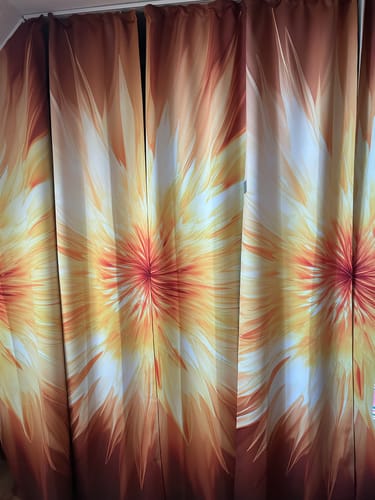 Customer photo review of Fotovorhang "Sonneneruption"
