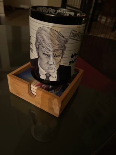 Customer photo review of Mug - Defiant Trump Mugshot (Noir Edition) Cartooned by A.F. Branco - Collectible 15oz