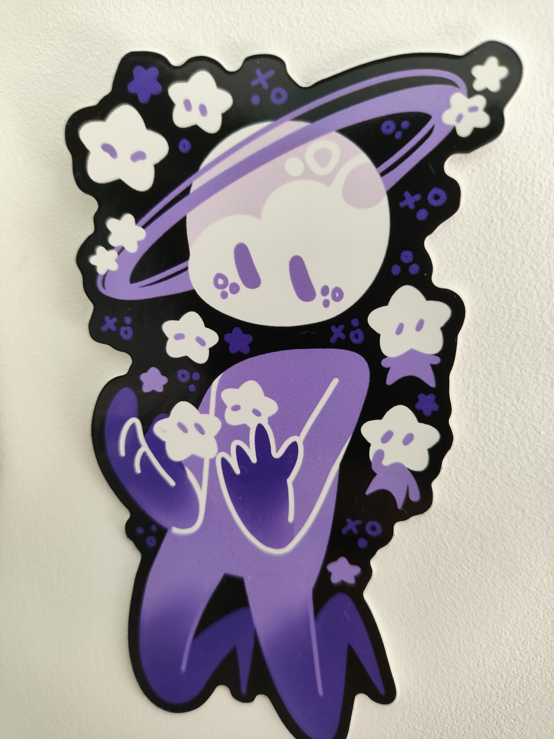 Customer photo review of Planet Person With Star Babies Sticker