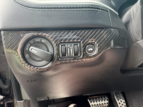 Customer photo review of Dodge Challenger 2015-2023 Carbon Fiber Headlight and Trunk Release Button Trim Overlay
