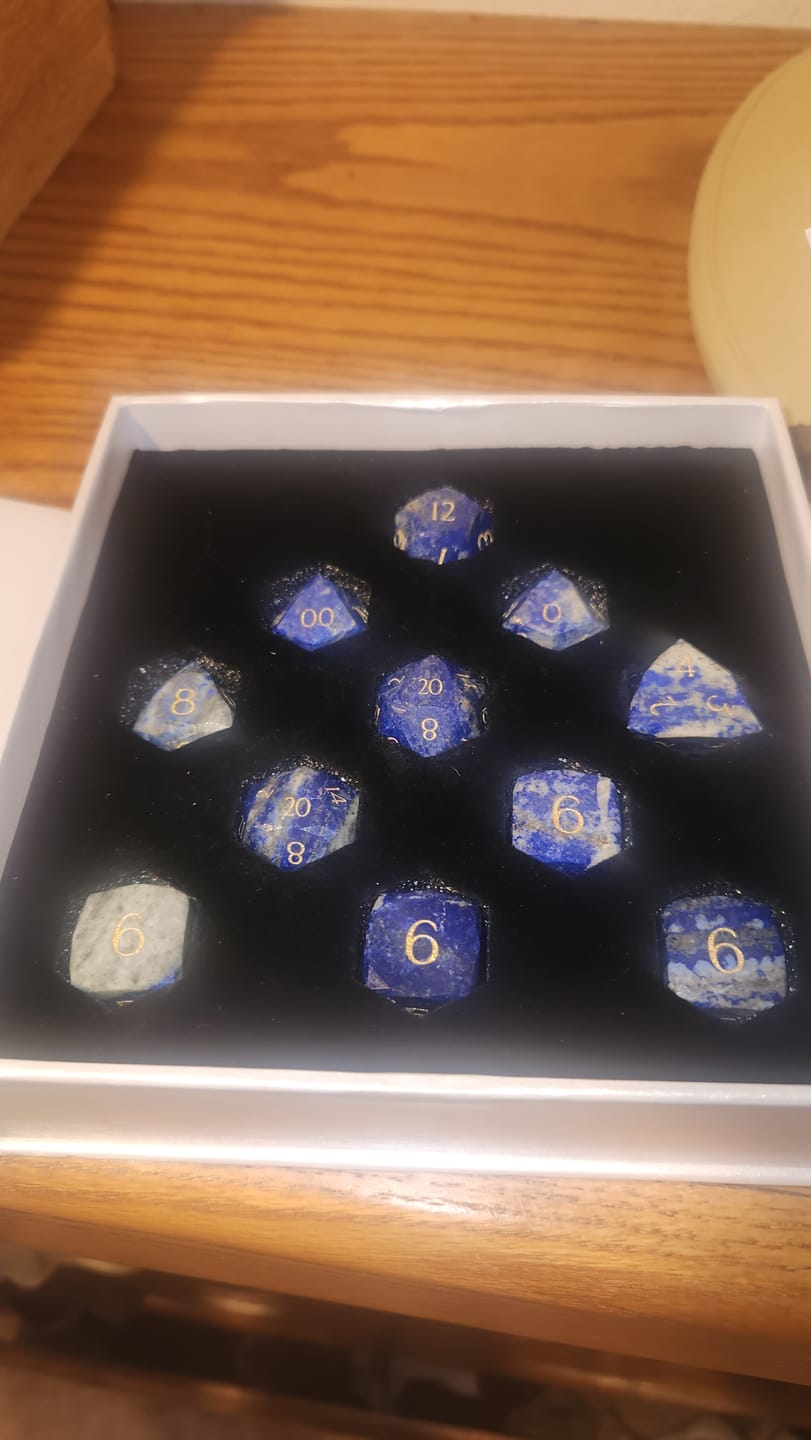 Customer photo review of URWizards D&D Multi-faceted Gemstone Engraved Dice Set