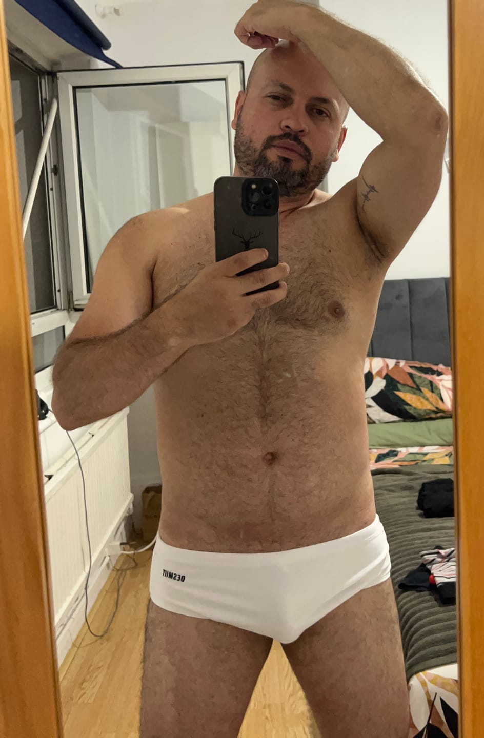 Customer photo review of Men’s Shiny Solid Color Swim Briefs