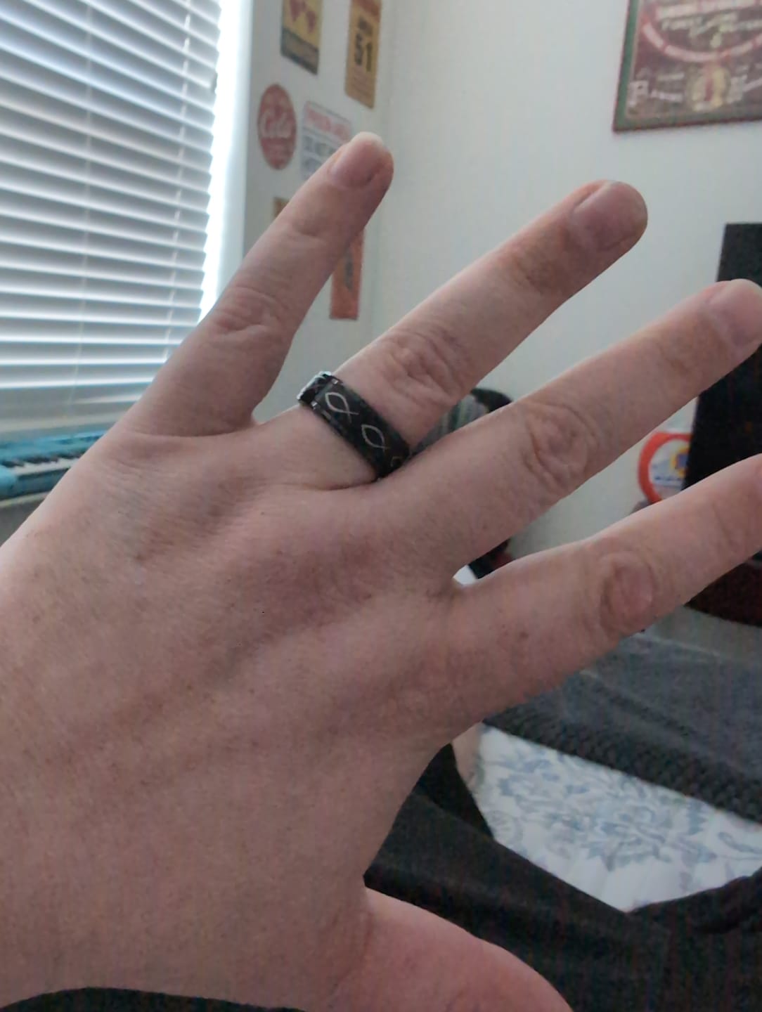 Customer photo review of Spinning Center Jesus Fish Tungsten Ring