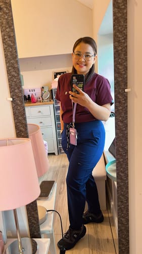 Customer photo review of 5-Pocket MoveTech® Scrub Top - Women / Merlot