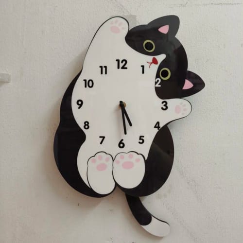 Customer photo review of Cute Cat Swing Tail Wall Clock
