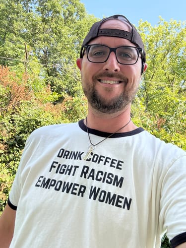 Customer photo review of Drink Coffee Empower Women Unisex T-shirt