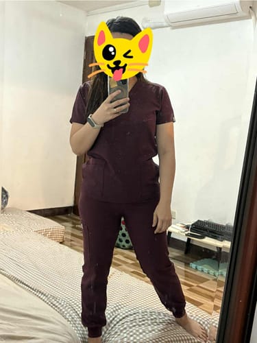 Customer photo review of 5-Pocket MoveTech® Scrub Top - Women / Merlot