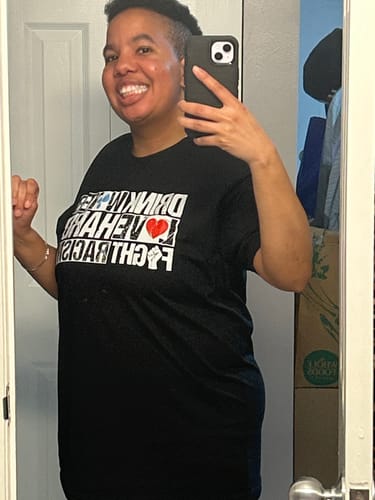 Customer photo review of Drink Water Fight Racism Remix Unisex Premium T-shirt