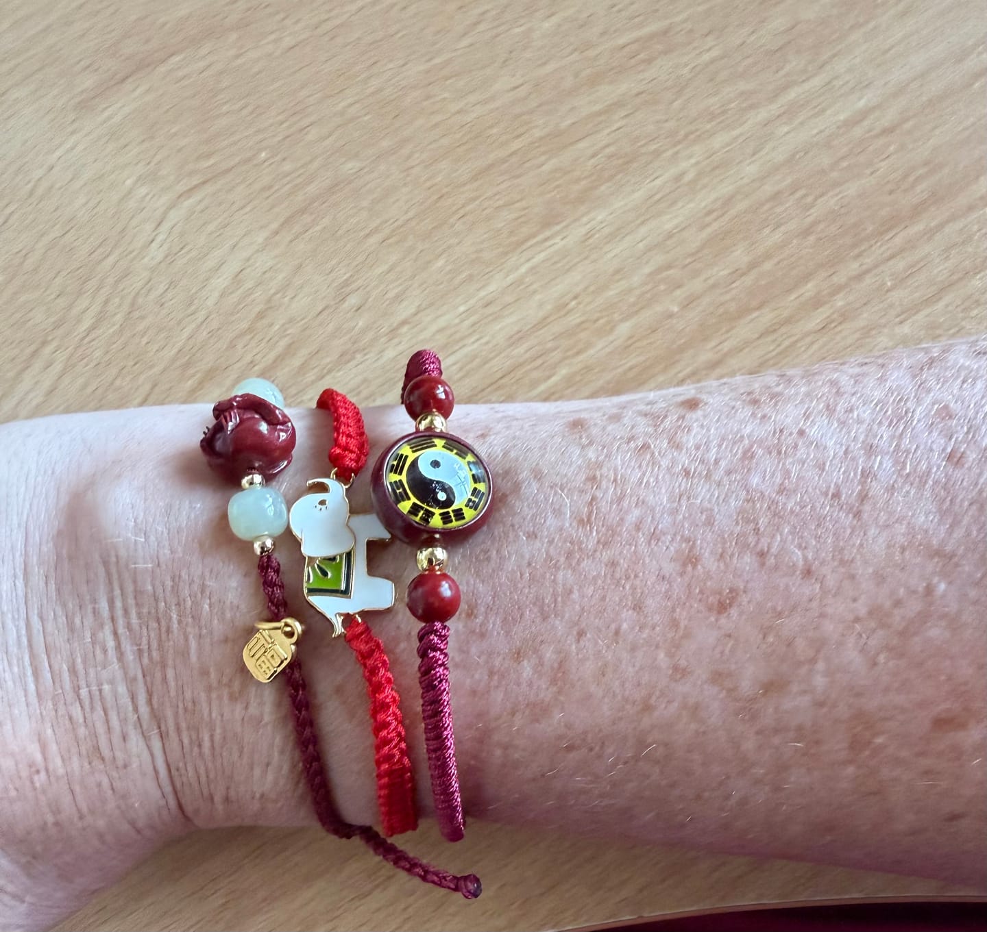 Customer photo review of Buddha Stones Natural Cinnabar Chinese Zodiac Hetian Jade Fu Character Luck Rope Bracelet