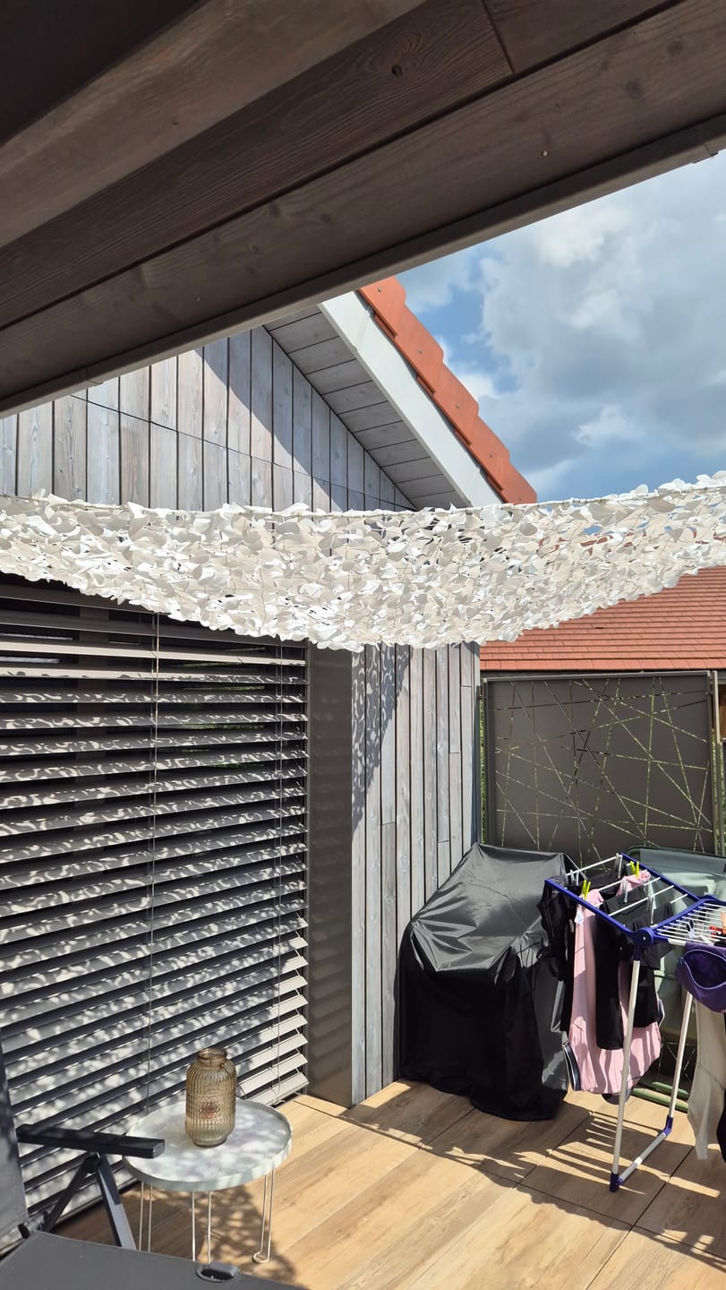 Customer photo review of Filet de camouflage triangulaire blanc