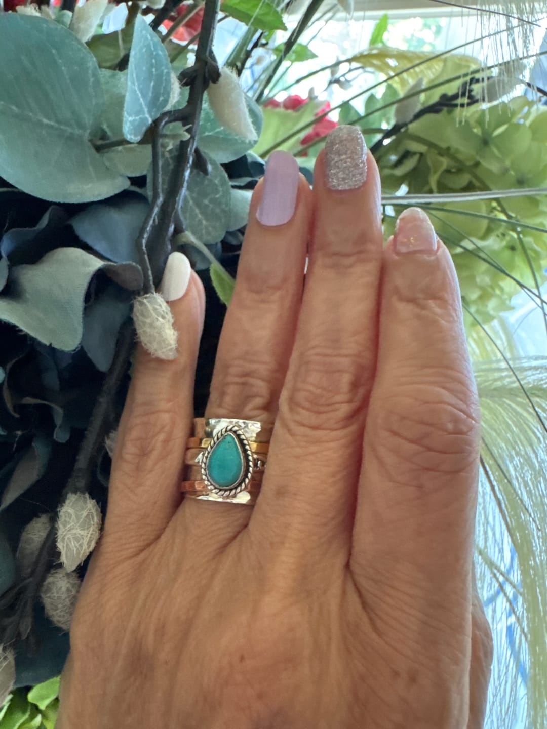 Customer photo review of Teardrop Turquoise Fidget Ring Sterling Silver