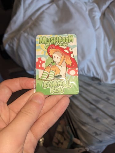 Customer photo review of Red Mushroom Ghost Enamel Pin