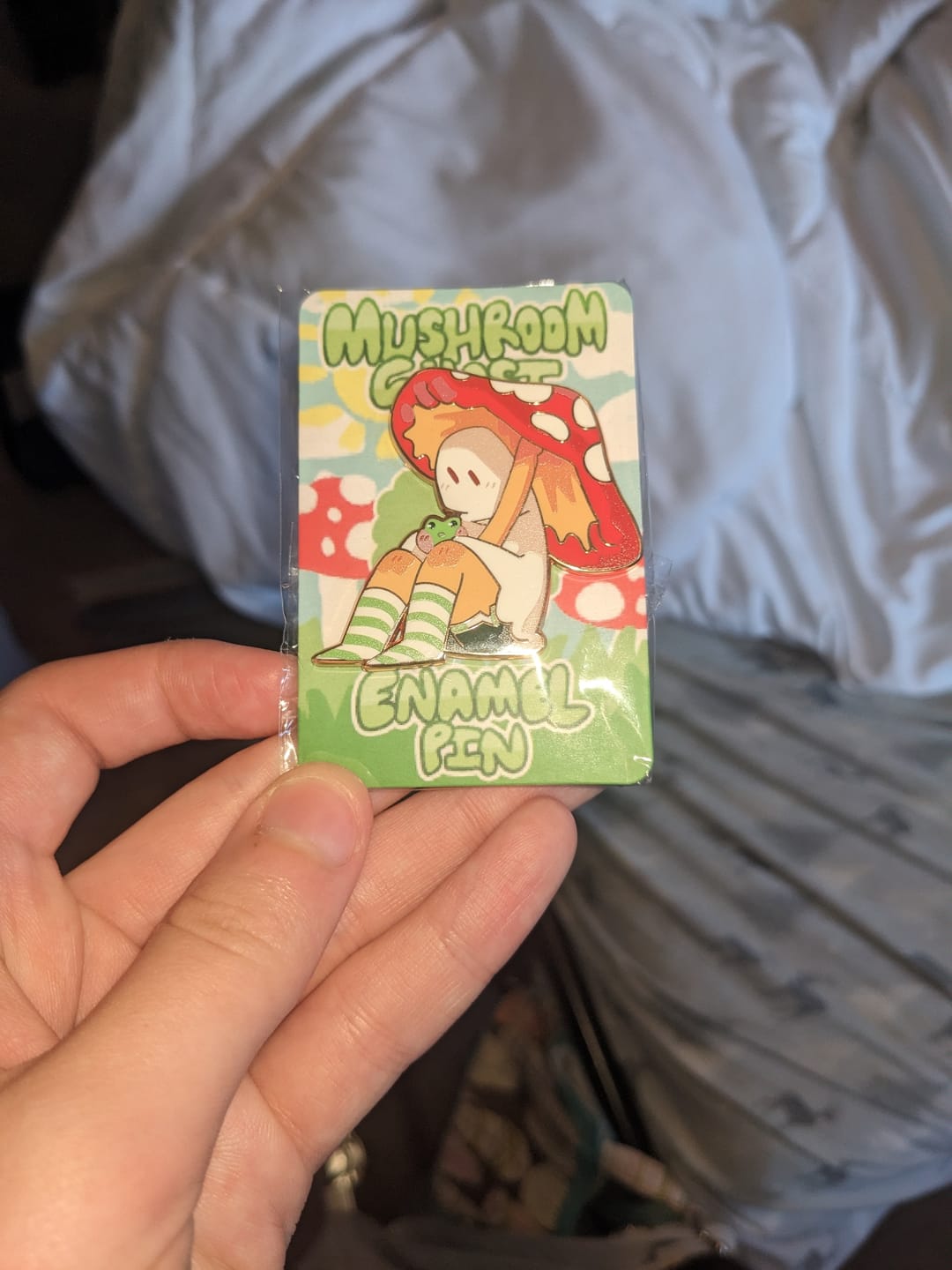 Customer photo review of Red Mushroom Ghost Enamel Pin