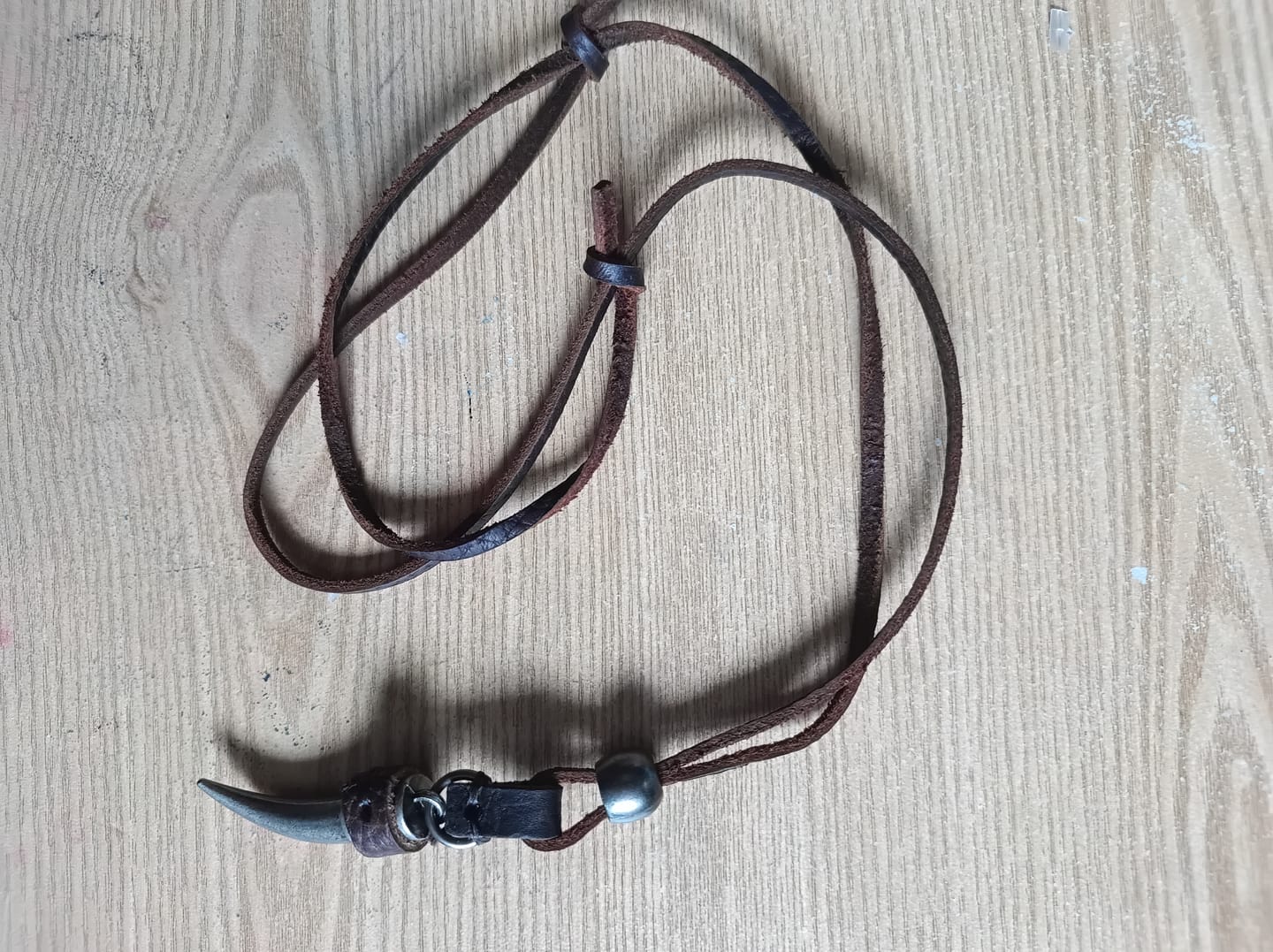 Customer photo review of Collar Colmillo Acero con Piel