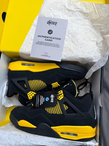 Customer photo review of Nike Air Jordan 4 Retro 'Thunder' 2023