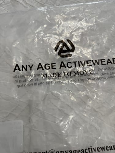 Customer photo review of Anti-Muffin-Top Flowy Tank Top