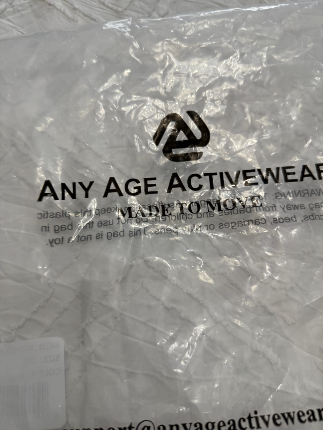 Customer photo review of Anti-Muffin-Top Flowy Tank Top