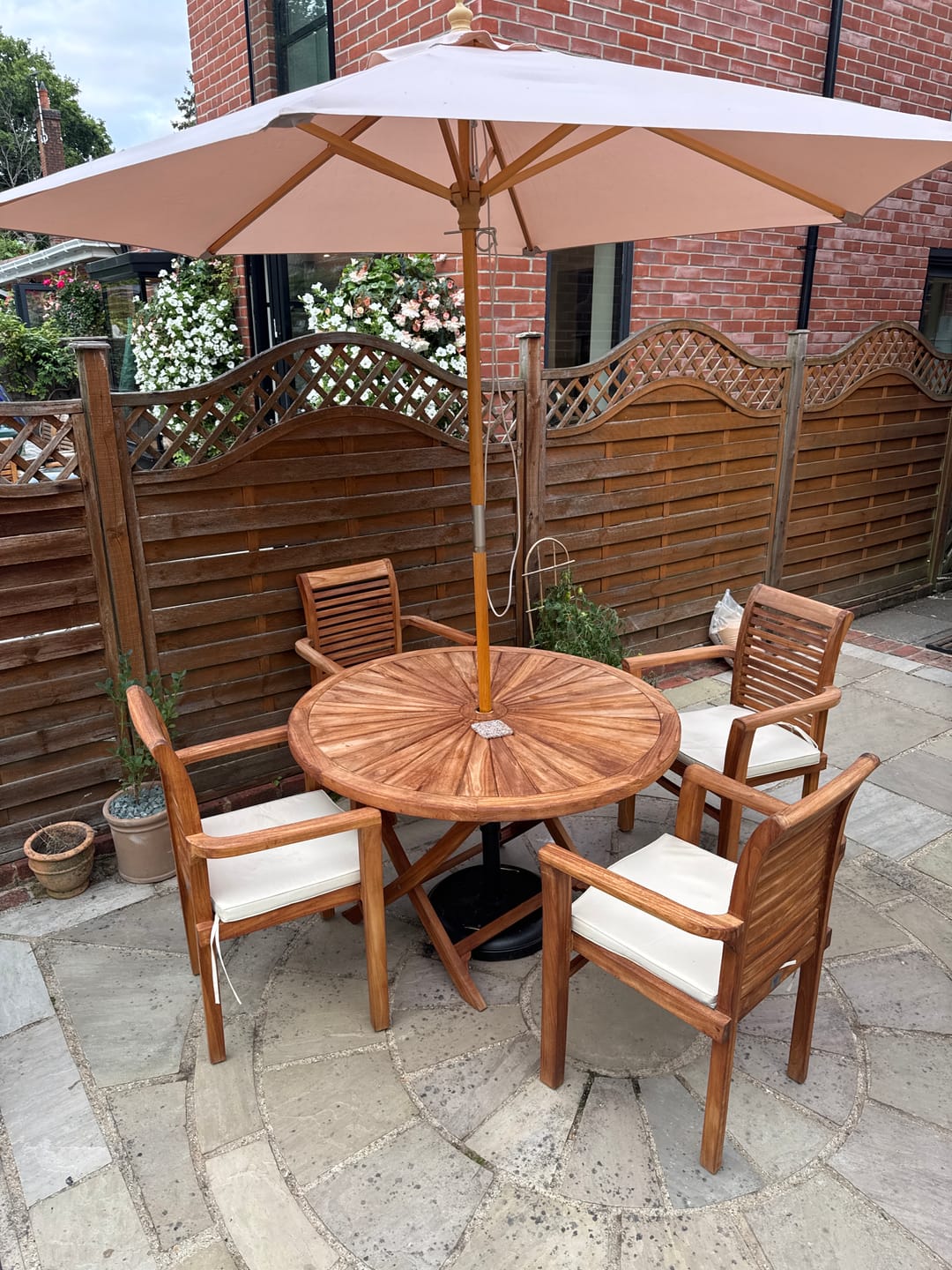 Customer photo review of Teak Garden Furniture Set 120cm Round Sunshine Table 4 x Oxford Stacking Chairs Cushions Included