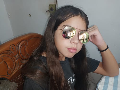 Customer photo review of Pink Aviator Kids Sunglasses from 10 years