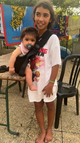 Avis photo d'un client sur Porte-bébé MomSwing - Noir Intense