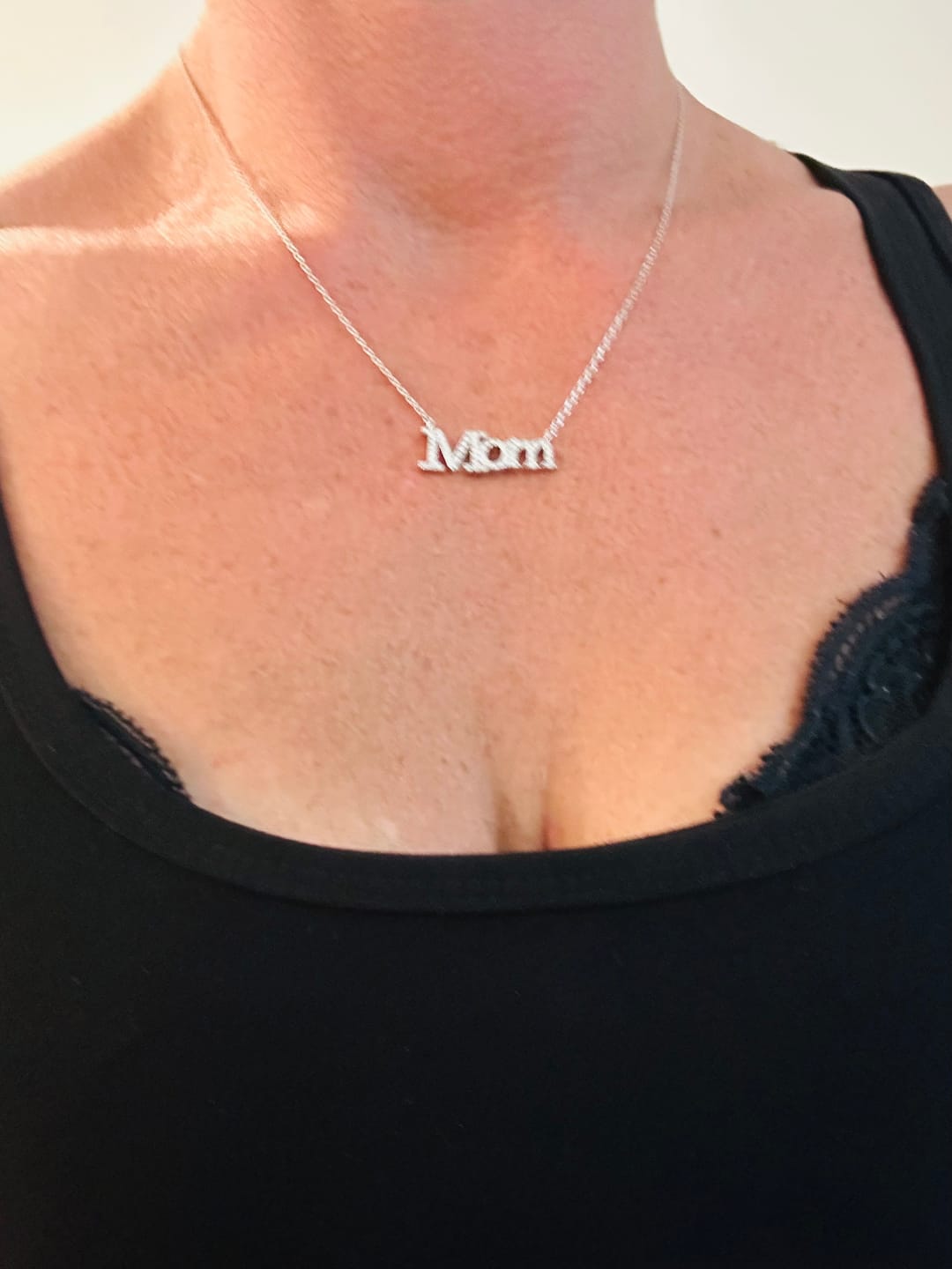 Customer photo review of Carrie 18k White Gold Plated Mom Necklace with Swarovski Crystals