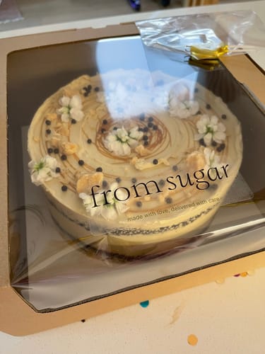 Customer photo review of chocolate caramel cake