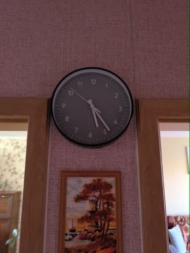 Customer photo review of Minimalist Green Wall Clock