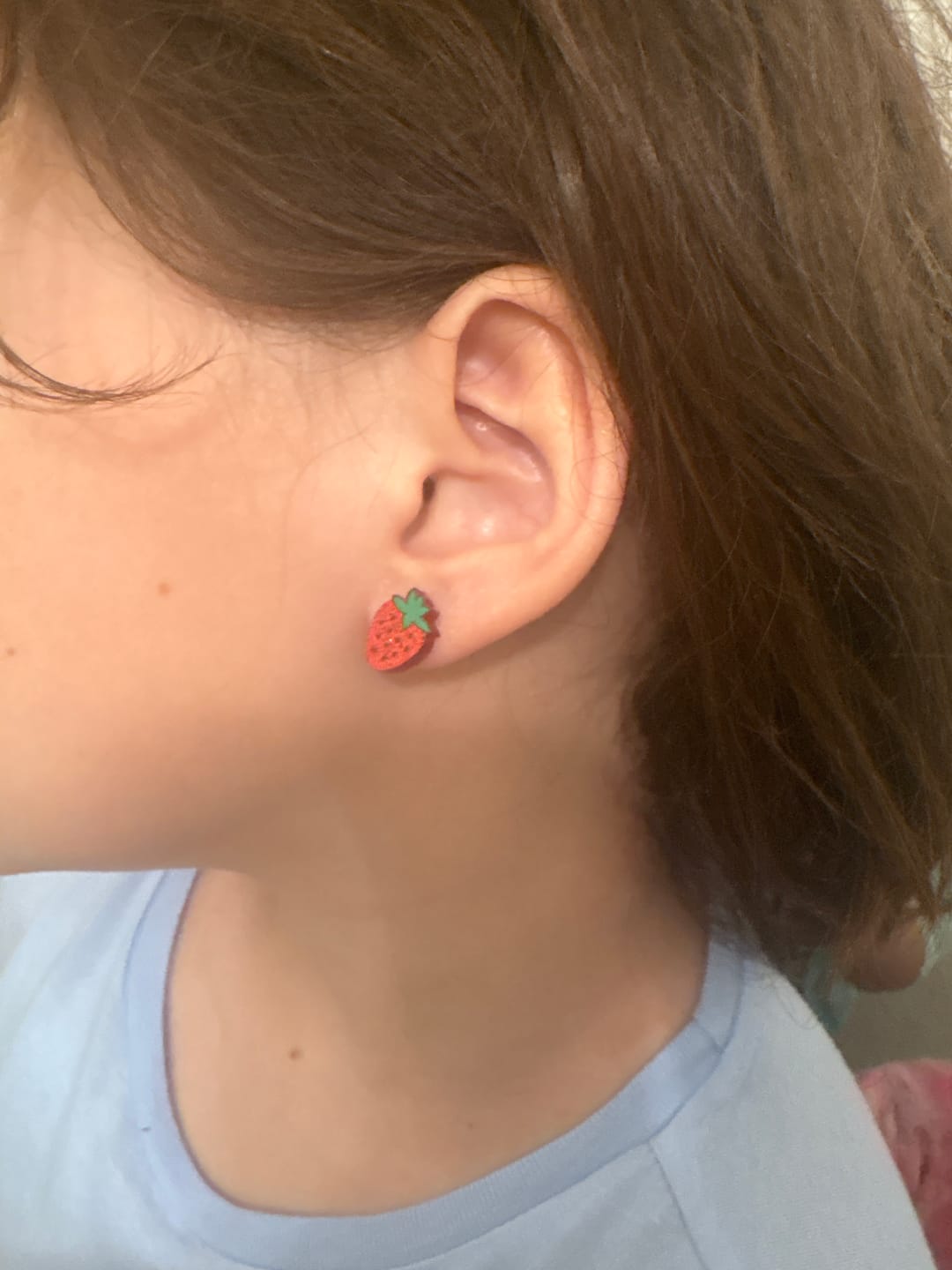 Customer photo review of Strawberry Studs Hypoallergenic Earrings for Sensitive Ears Made with Plastic Posts