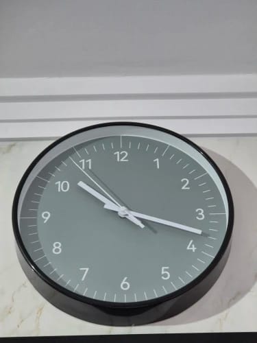 Customer photo review of Minimalist Green Wall Clock