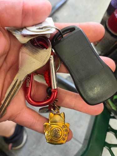 Customer photo review of Vintage Lucky Cat Feng Shui Keychain