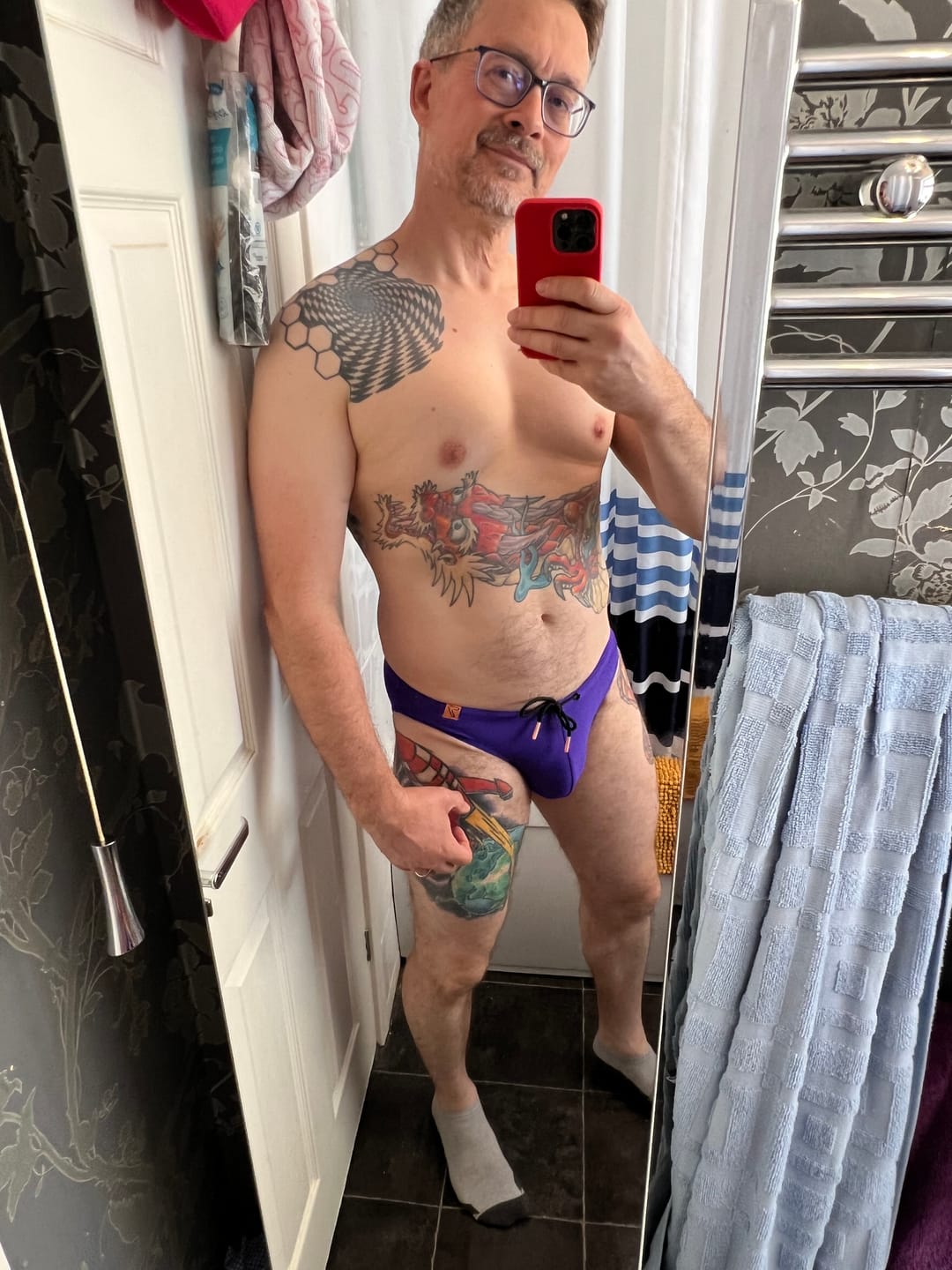 Customer photo review of Coral Purple Swim Briefs