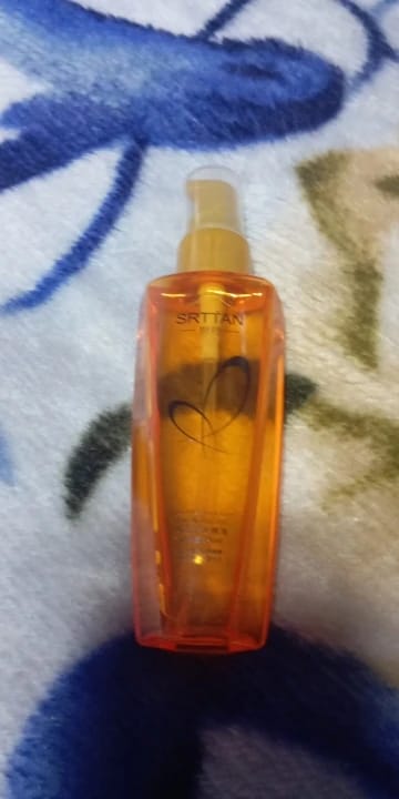 Customer photo review of Argan Oil Hair Serum Lightweight Split Ends Mist — Amber Gold | KIMLUD