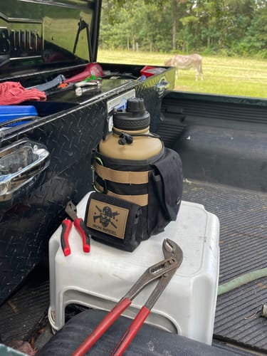 Customer photo review of 64oz Battle Bottle Water Bottles