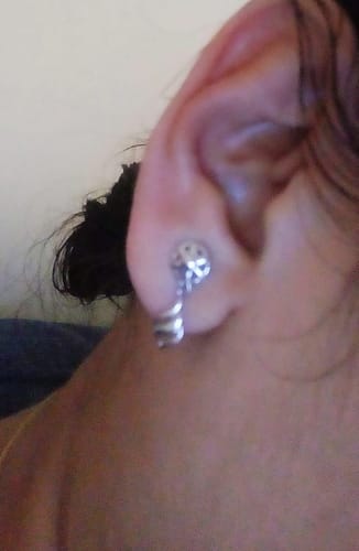Customer photo review of Silver Floral Twist Earrings