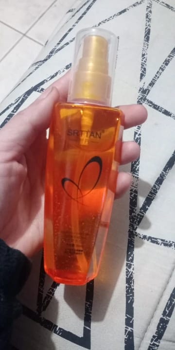 Customer photo review of Argan Oil Hair Serum Lightweight Split Ends Mist — Amber Gold | KIMLUD