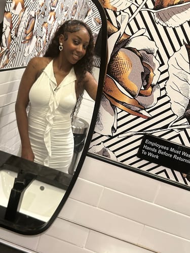 Customer photo review of Call On Me Mesh Halter Tie Ruffle Dress