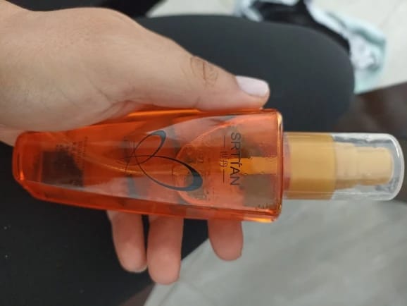 Customer photo review of Argan Oil Hair Serum Lightweight Split Ends Mist — Amber Gold | KIMLUD