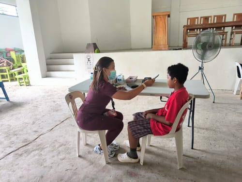 Customer photo review of Jogger MoveTech® Scrub Pants - Women / Merlot